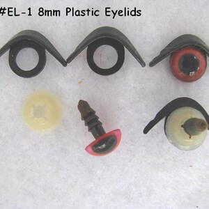 May include: Eight 8mm plastic eyelids for stuffed animals. The eyelids are black and come in pairs. There are also two plastic eyes with red and white pupils.