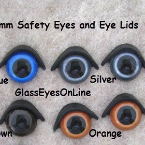 May include: 12mm safety eyes and eye lids in blue, silver, brown, and orange. GlassEyesOnLine.