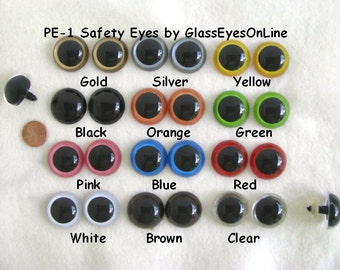May include: Assortment of 12 pairs of plastic safety eyes in various colors, including gold, silver, yellow, black, orange, green, pink, blue, red, white, brown, and clear. The eyes are arranged in rows on a white surface. PE-1 Safety Eyes by GlassEyesOnLine.