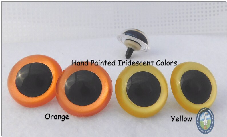 May include: Two pairs of plastic safety eyes for crafts. The eyes are iridescent and come in orange and yellow. The eyes have black pupils and are hand painted.