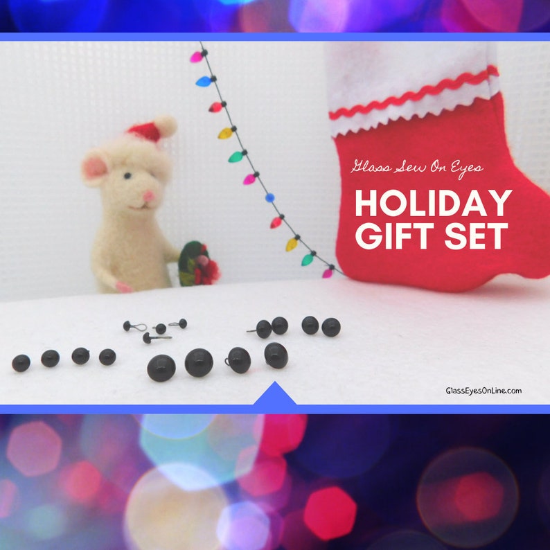 May include: A set of black glass eyes for crafts, with a white felt mouse and a red stocking with the text "Glass Jew On Eyes HOLIDAY GIFT SET" in the background.