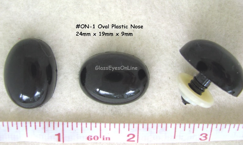 May include: Three black plastic oval-shaped noses with a screw-on back. The noses are 24mm x 19mm x 9mm. #ON-1 Oval Plastic Nose. GlassEyesOnLine.