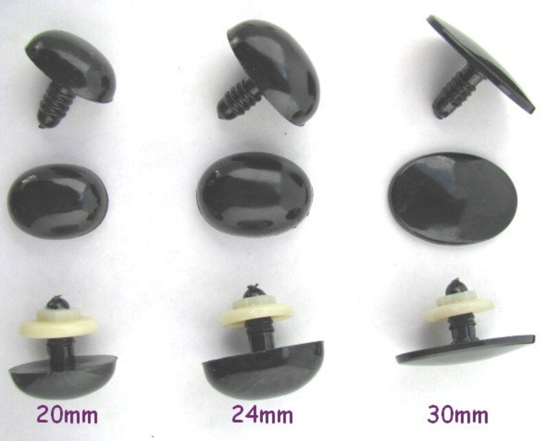 May include: Assortment of black plastic safety eyes for stuffed animals in three sizes: 20mm, 24mm, and 30mm. The eyes have a flat back and a post for attaching to fabric.