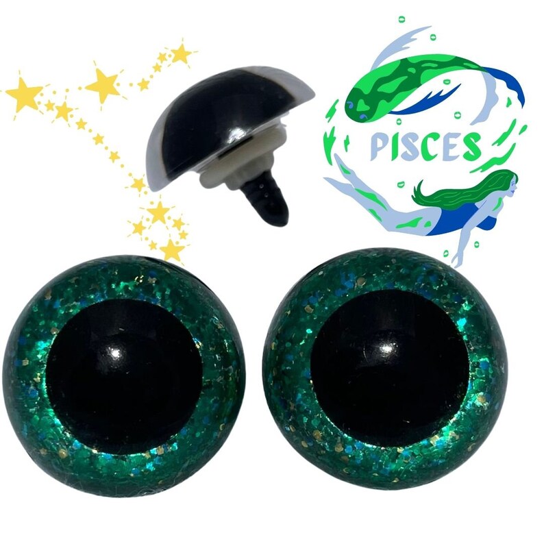 May include: Two green glitter safety eyes with black pupils and a silver plastic safety eye with a black screw. The image also includes a green and blue illustration of a mermaid with the word "Pisces" written below.