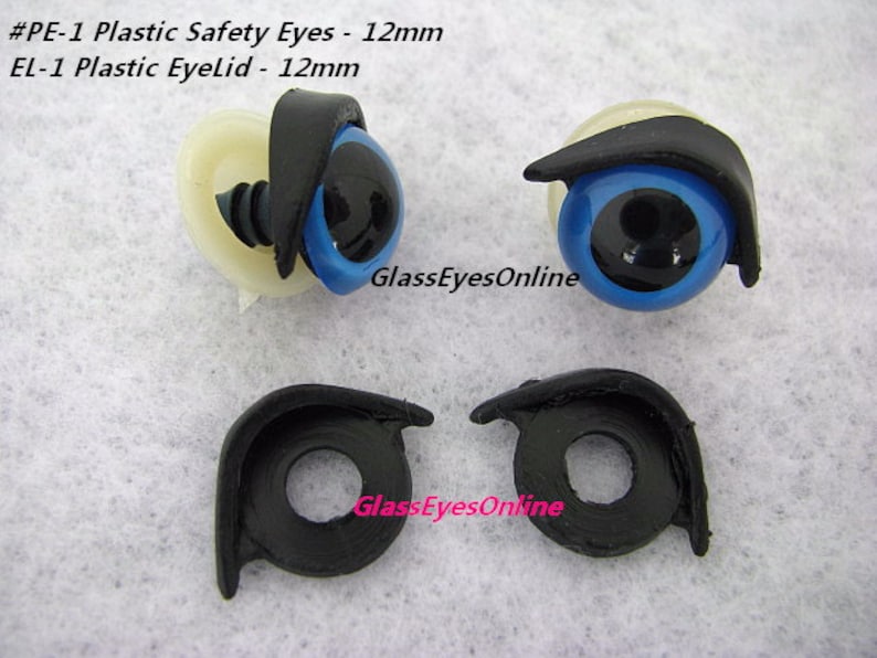 May include: Two blue plastic safety eyes with black pupils and black plastic eyelids. The eyes are 12 mm in diameter. #PE-1 Plastic Safety Eyes - 12mm EL-1 Plastic Eyelid - 12mm GlassEyesOnline