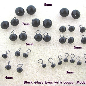 K&ouml;nnte beinhalten: Verschiedene Gr&ouml;&szlig;en schwarzer Glasaugen mit Schlaufen, Modell LP201, in den Gr&ouml;&szlig;en 3mm, 4mm, 5mm, 6mm, 7mm und 8mm. Diese gl&auml;nzenden, runden Augen eignen sich ideal f&uuml;r Bastelarbeiten und Puppenherstellung.