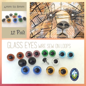 May include: Twelve pairs of glass eyes for crafts, ranging in size from 4mm to 8mm. The eyes are assorted colours, including brown, black, green, blue, and purple. The eyes have wire loops for sewing on.