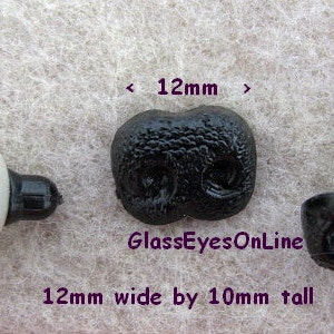 May include: Black plastic safety eyes for crafts, measuring 12 mm wide by 10 mm tall.  The eyes are designed for sewing onto stuffed animals, dolls, and other projects.  The eyes have a flat back and a small post for easy attachment.