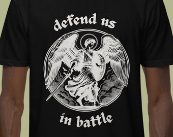 May include: Black t-shirt with a white graphic of an angel holding a sword and the text "defend us in battle".