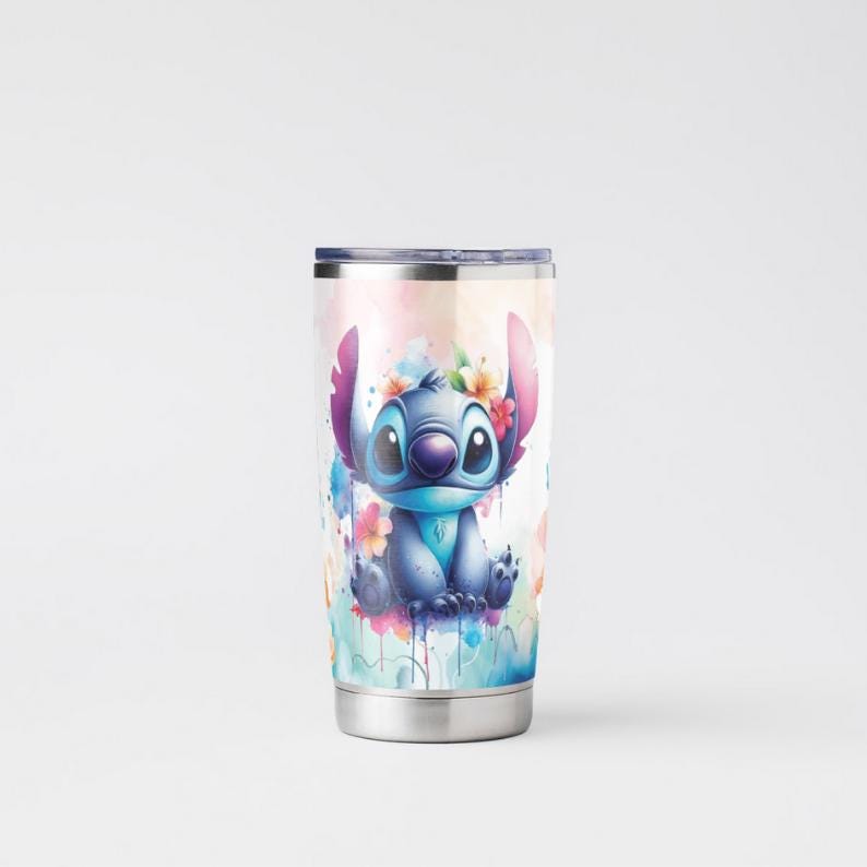 May include: A stainless steel tumbler with a colourful watercolour design featuring Stitch from Lilo & Stitch. Stitch is wearing a flower crown and surrounded by colourful flowers.