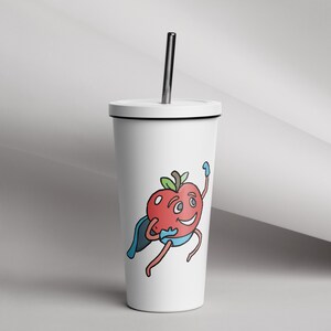 May include: White tumbler with a black lid and a red apple character wearing a blue cape and a blue glove. The apple character has a smiling face and is holding a red apple.
