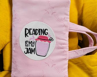 Pink Cotton Fabric Book Cover, Handles and Reading Is My Jam Patch