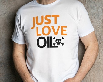 May include: White t-shirt with the text "JUST LOVE OIL" in orange and black with a skull and crossbones graphic.