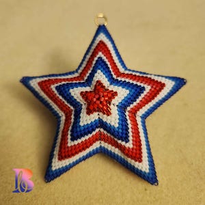 Concentric stars and ribbons, shades of red/blue and white / John / TUTORIAL - 3D Peyote Star - 8 color - starry fun