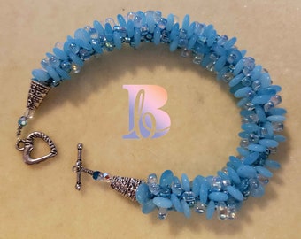 8.5" blue lentils pop-on-top beaded kumihimo bracelet with toggle closure