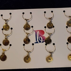 Celestial Zodiac gold plate, double sided wine charms, set of 12