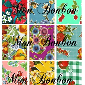 Pode incluir: Nove amostras de tecido com um padrão repetitivo de frutas, flores e cerejas. As amostras de tecido estão dispostas em uma grade de 3x3. O texto "Mon Bonbon" está escrito em itálico nas amostras.