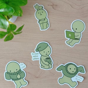 green guy stickers | green guy on laptop | green guy with sweater