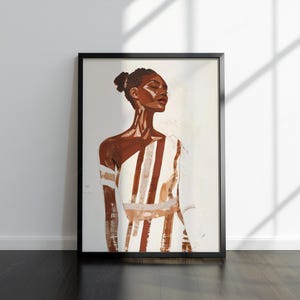 May include: A framed art print showing a portrait of a person with brown skin. The person has closed eyes and a calm expression, wearing a white and brown striped garment. The artwork is set against a white background.