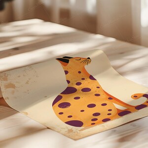 May include: An illustration of a stylized cat in orange with purple spots, sitting with its eyes closed. The artwork is on a rolled-up paper with a beige background and a distressed, vintage aesthetic.