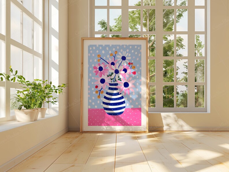 May include: A framed illustration of a blue and white striped vase filled with pink and white flowers on a blue background with white polka dots. The vase is sitting on a pink background with white polka dots.