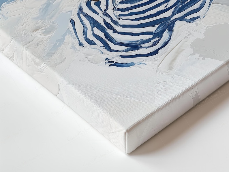 May include: An abstract painting on canvas with blue and white brushstrokes. The artwork has a textured appearance, with visible paint strokes and a white background. The canvas is stretched and mounted on a wooden frame. The painting is a close-up view.