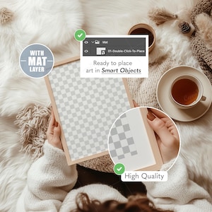 May include: A wooden picture frame with a mat layer, ready for art, is held. The frame is displayed on a soft, white, textured surface. A cup of tea and a cozy blanket are also visible. The image is labeled "High Quality."
