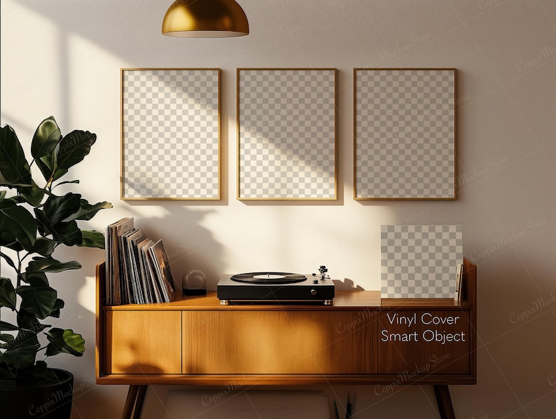 May include: A mid-century modern style living room setup with three gold-framed art prints, a wooden record cabinet, and a record player. A large potted plant and a gold pendant light add to the decor. The text "Vinyl Cover Smart Object" is visible.