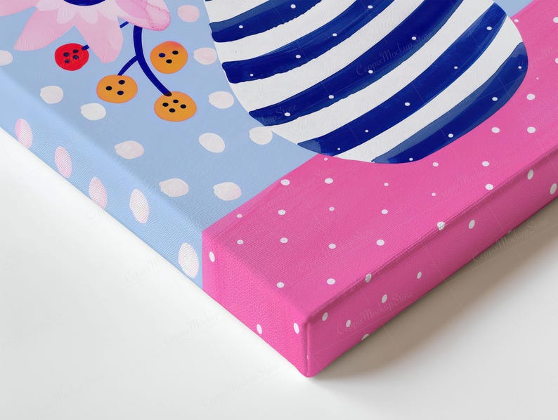 May include: A corner view of a canvas art piece. The artwork features a blue background with white polka dots, a pink section with white polka dots, and a blue and white striped design. Floral and berry elements are also visible.