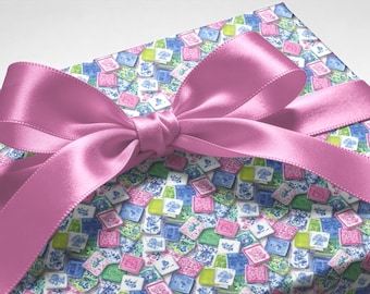 Papel de regalo con diseño de fichas de mahjong, colores elegantes, ecológico y de lujo para regalos y celebraciones.