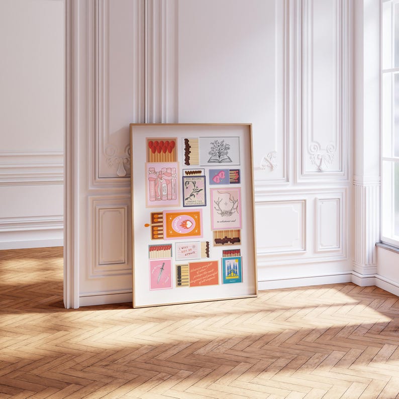 May include: A framed collage of matchbox labels with various illustrations and text. The labels feature a variety of colors, including pink, orange, blue, and green. The text on the labels includes phrases like "I will go to the ends of the earth for you" and "The world is a book and those who do not travel read only one page".