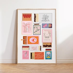 May include: A collection of matchboxes with various designs and quotes. The matchboxes feature illustrations of flowers, a heart, a deer, a book, and a castle. The quotes include "You Belong Among the Wildflowers", "I Will Not Be Afraid", and "To Whatever End".