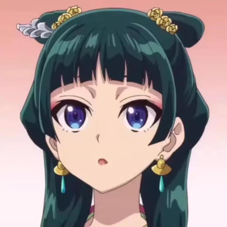 May include: Anime-style illustration of a woman with dark green hair and blue eyes. She wears gold earrings with teal accents and gold hair ornaments. Her makeup includes pink eyeshadow and a light pink lip color. The background is a soft pink.
