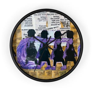 May include: A round wall clock with a black frame featuring a collage background of text that reads, remember who you were before the world told you who you should be, overlaid with four purple silhouettes of children walking in a line.