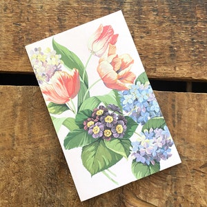 May include: A floral illustration featuring pink, orange, and purple flowers with green leaves on a white background.