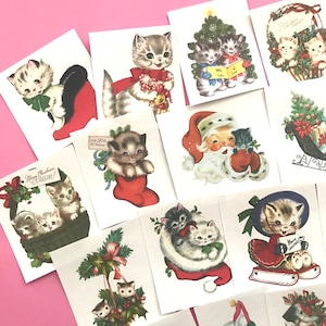 May include: A set of 10 vintage Christmas stickers featuring adorable kittens in various holiday scenes. The stickers feature kittens wearing Santa hats, riding in sleighs, and holding Christmas presents. The stickers are perfect for adding a touch of holiday cheer to your cards, gifts, and crafts.