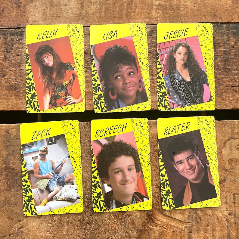 May include: Six vintage trading cards featuring cast members from a 1990s television show. Each card has a yellow border with a black zig-zag pattern. The cards display headshots of the characters with their names printed above.