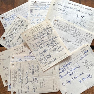 May include: A collection of vintage medical prescription slips and forms with handwritten notes. The forms are from different doctors and hospitals, including The Robert Packer Hospital, Tioga County General Hospital, and Wayne H. Allen, M.D. The forms include patient names, dates, and medical instructions.