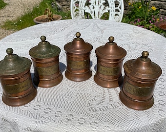 Set of 5 French copper canisters. Tin lined spice / herb storage jars or pots Mustard, laurel, clove, thyme and saffron. Brass name plaque