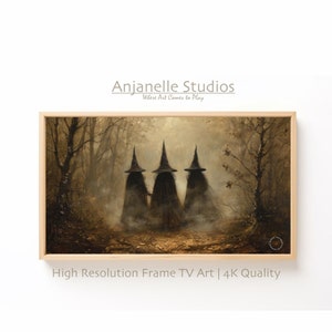 May include: Three witches in black robes and pointed hats walk through a misty forest. The forest is filled with brown and gold leaves. The witches are silhouetted against the light.