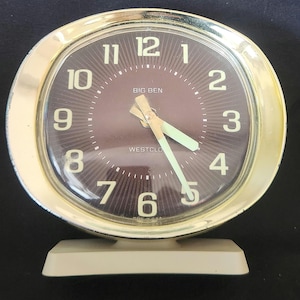 May include: A set of three ceramic mugs with a speckled, matte finish. The mugs are in shades of cream, light gray, and dark gray. Each mug has a simple, minimalist design, perfect for coffee or tea.