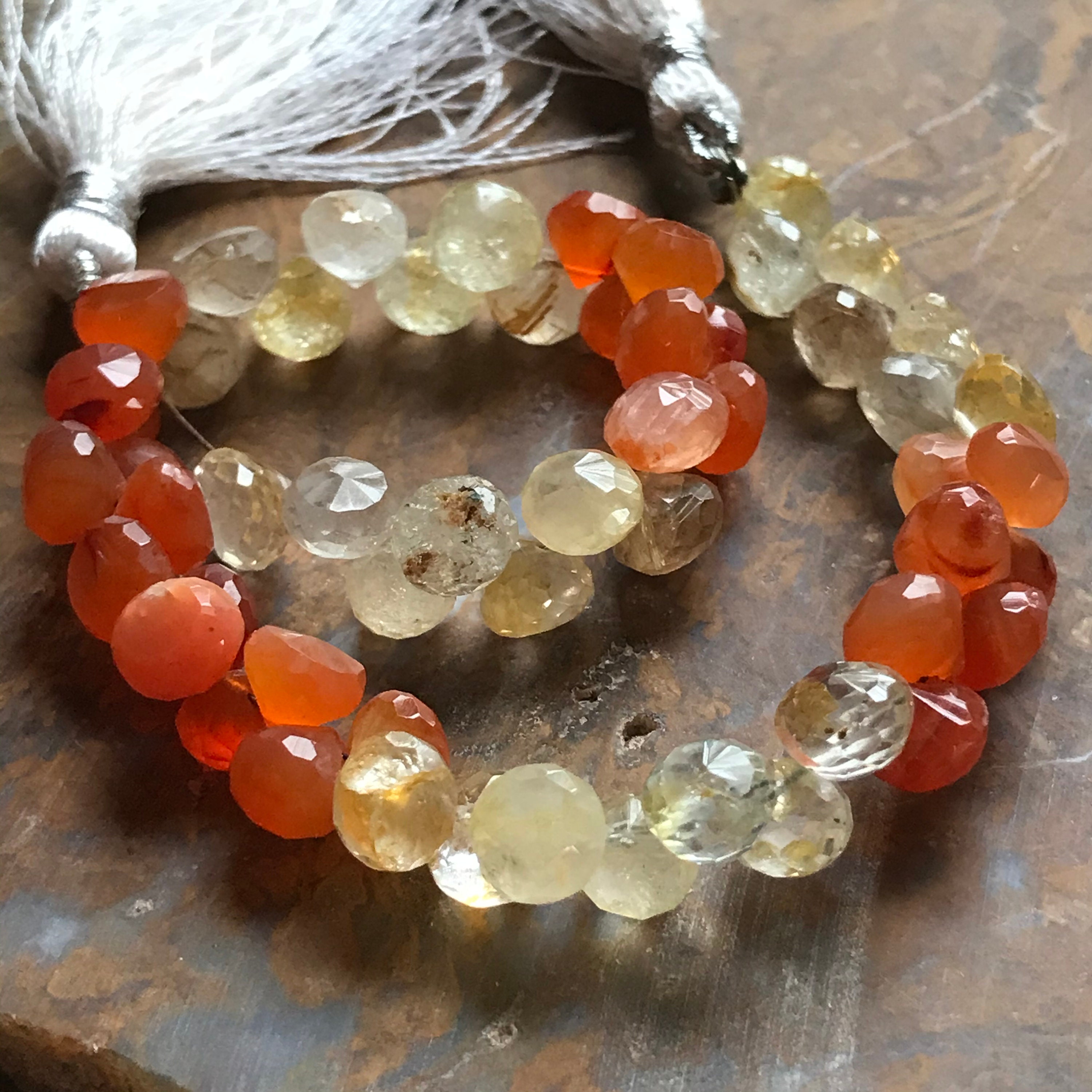 Carnelian and Golden Quartz faceted briolettes onion shaped full strand Carnelian and Golden Quartz faceted briolettes onion shaped full strand