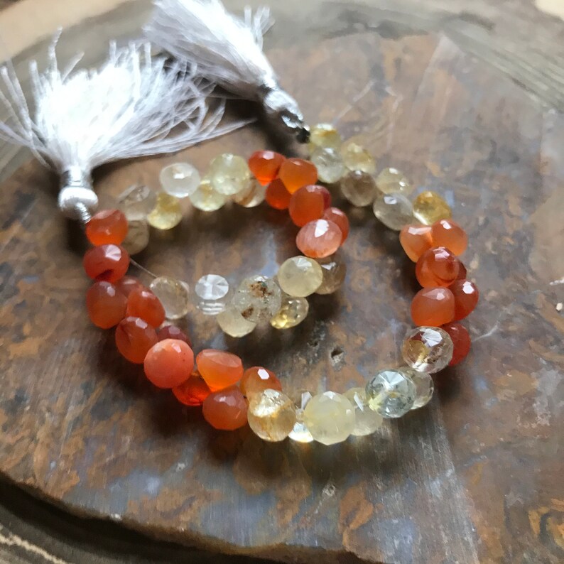 Carnelian and Golden Quartz faceted briolettes onion shaped full strand Carnelian and Golden Quartz faceted briolettes onion shaped full strand