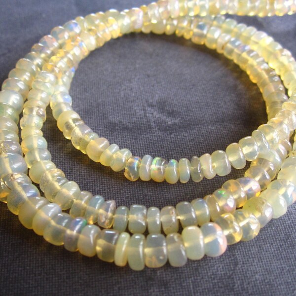 14 Inches of Ethiopian Opals - smooth polished graduated strand - rondelles beads