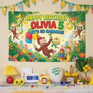 May include: A rectangular birthday banner featuring a cartoon monkey, a man in a yellow shirt, and the text "HAPPY BIRTHDAY OLIVIA 5 LET'S GO BANANAS!" set against a jungle background with colorful balloons, gift boxes, and hanging banana clusters.