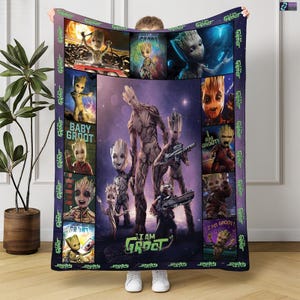 May include: A rectangular blanket featuring various images of Groot from Guardians of the Galaxy. The blanket has a purple and blue background with the words "I AM GROOT" and "BABY GROOT" printed on it. The blanket is made of a soft material.