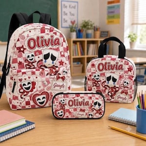 May include: A backpack, lunch bag, and pencil case set featuring a red and white checkered pattern, theater masks, and the name Olivia printed in red. Each item displays a sad mask with blue tears and a happy mask, with the text Gangle included.