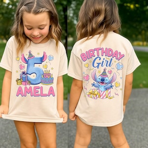 two little girls wearing matching birthday shirts
