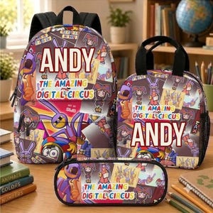 May include: A backpack, a lunch bag, and a pencil case featuring a colorful collage of characters from The Amazing Digital Circus. Each item displays the text ANDY and THE AMAZING DIGITAL CIRCUS in bold lettering against a vibrant, multi-patterned background.
