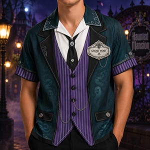 May include: A short-sleeved button-down shirt featuring a teal jacket overlay with ghost patterns, a purple pinstriped vest, and a white collar. A black necktie and a silver-toned name tag reading GHOST HOST JS are attached to the front.